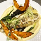 Filet z sandacza na czarnej soczewicy z puree z pasternaku i pieczoną dynią Elbląg